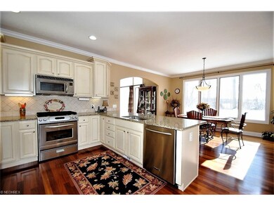 Immaculate eat-in kitchen with stainless, crown mo
