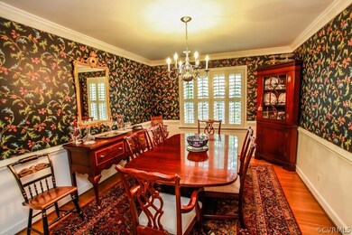 Formal dining room with chairrail and crown mouldi