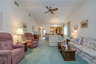 SPACIOUS LIVING ROOM WITH VAULTED CEILINGS