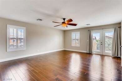 Master Bedroom with french doors out to balcony