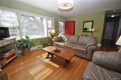 Light filled living room with beautiful original h