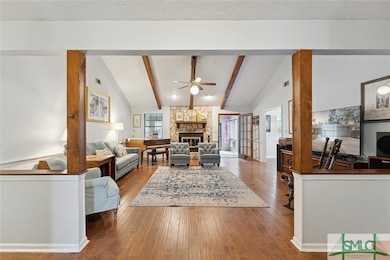 Living Room w/vaulted & beam ceilings