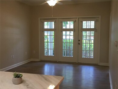 Living room gets lots of light from screened porch