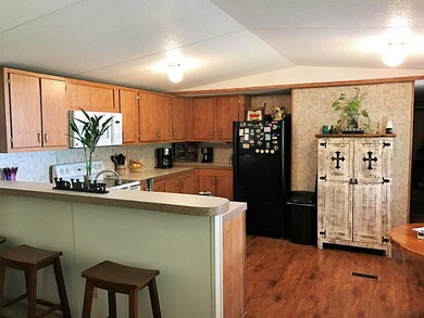 Loads of cabinets with breakfast bar