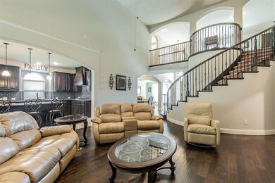Curved staircase with Juliet Balcony.