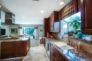 Kitchen opens to family room and to beautifully la