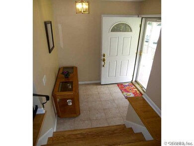 Foyer. /welcoming foyer will greet friends and fam