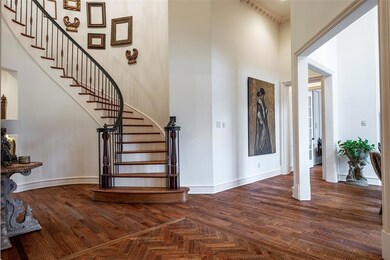 FROM THE FOYER THE FORMAL LIVING ROOM SITS ON YOUR RIGHT
