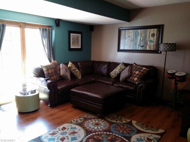 Cozy Family Room is where these owners enjoy down 