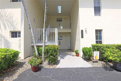 Entrance to property featuring stucco siding and a
