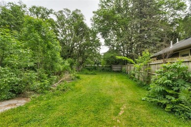Extra Deep, Partially Fenced Semi-Private Back Yar