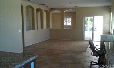 Great room with arches open to hall passage way an