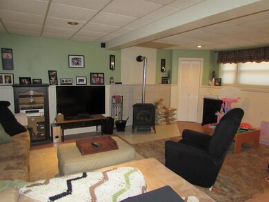 Finished lower level family room with economical p