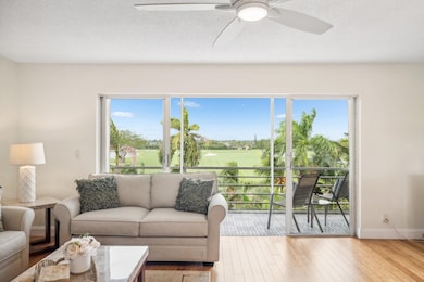 Open and natural light come through this meticulously maintained unit! Bamboo flooring throughout living areas. Fantastic tropical Golf Course Views! Much more beautiful in person!