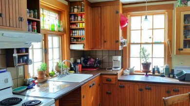 Note the antique cabinetry hardware.