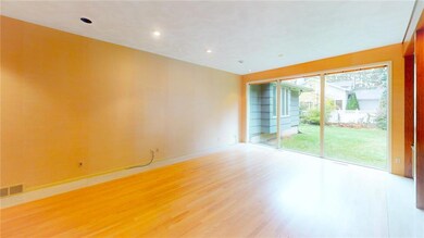 Hardwood flooring and recessed lights add characte