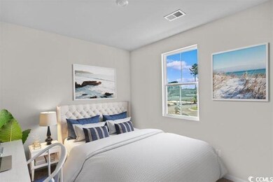 Bedroom featuring visible vents