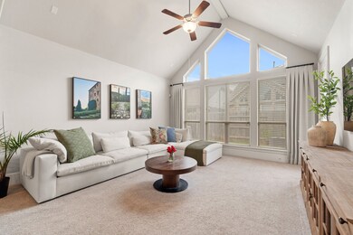 This incredible living area showcases a wall of wi