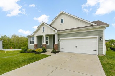 Gorgeous 4 year old home on a corner lot backing to common ground and walking trail.