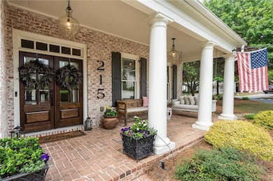 Entrance to property with covered porch, french do