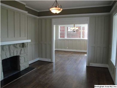 Living room flows to the dining room.  Photo taken