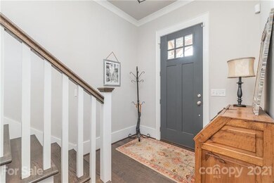 Beautiful foyer with engineered hardwood floors.