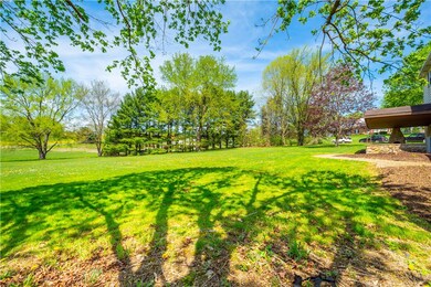 This yard is ready for sports, cookouts, and famil