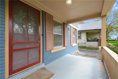 A covered front porch welcomes you home...