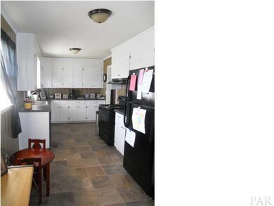 Side view of the kitchen...tons of cabinets and counter space