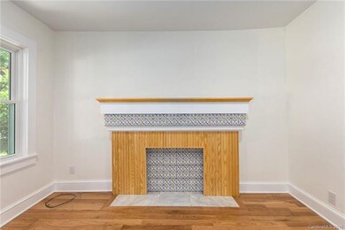 Unique tile in none functioning fireplace