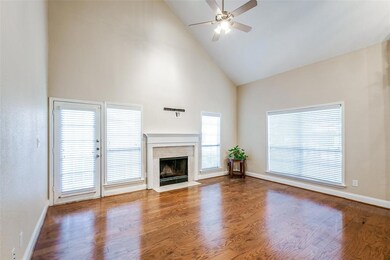 Living area with fireplace and plenty of natural l