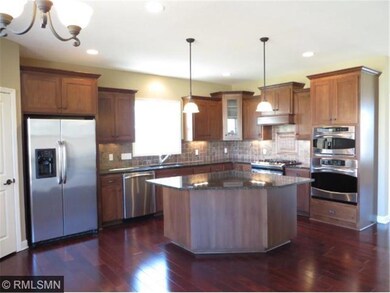 Gourmet kitchen, informal dining & family room are