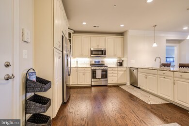 21022 Rocky Knoll Square unit 403, Ashburn, VA 20147 - photo 7