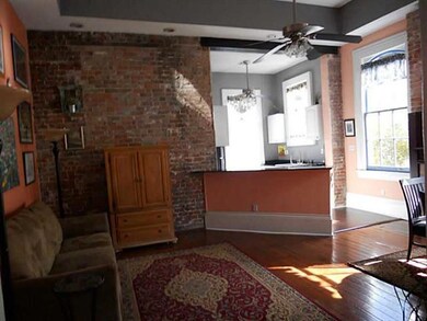 Photo. Living view towards kitchen