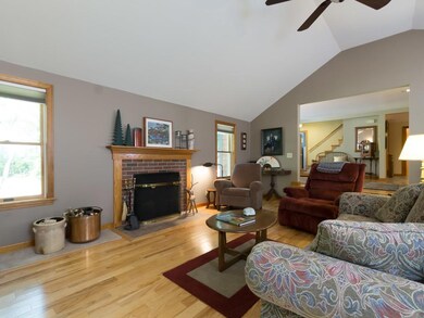 View of the fireplace and a look...