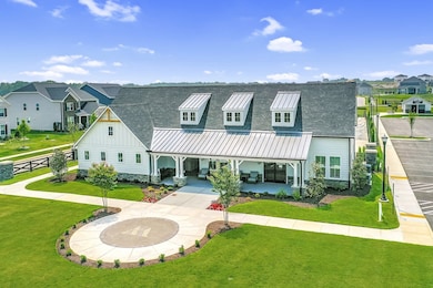 Stunning amenity center with state of the art fitness center, pool, outdoor showers, farmers pavilion, and playground OPEN NOW!!