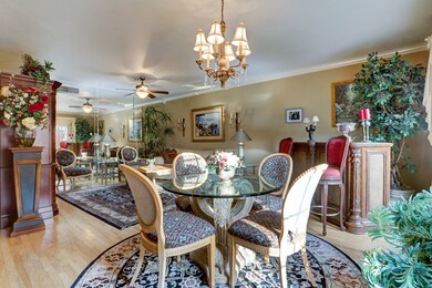 The open concept main living area has wood floorin
