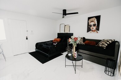 Living room with marble look tile flooring