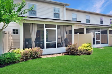 Screened in porch/back yard
