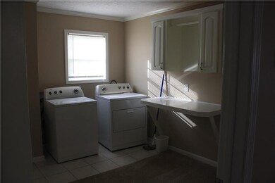 Large laundry area with built-ins
