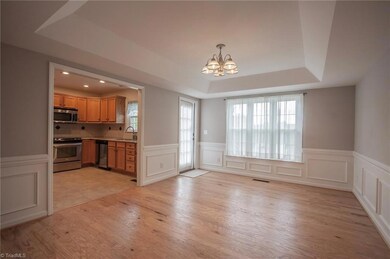 Generous Dining Room with Custom Ceiling.