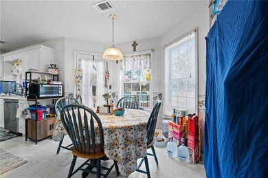 Dining room featuring a textured ceiling