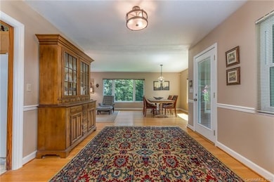 Expansive hallway with access to screen porch