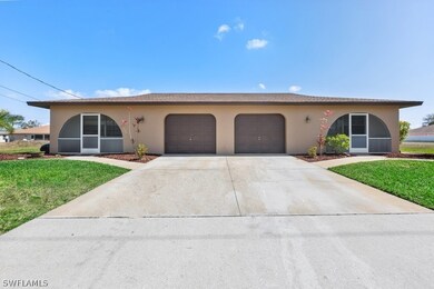 Center view of Duplex.   Unit 1 is on left.    Uni