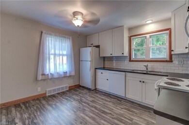 COMPLETE WITH NEW APPLIANCES! MOVE IN READY!