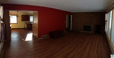 Panoramic view with back facing the rear windows.