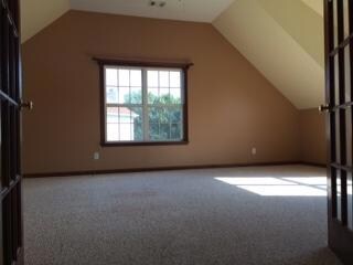 Large bonus room above the garage with storage