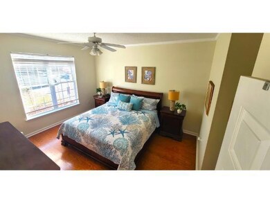 Bedroom featuring dark hardwood / wood-style floor