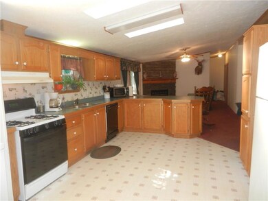 Kitchen complete with skylights and...