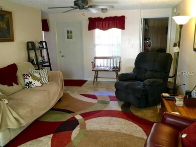 Living room view of front door entry.